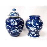 A Chinese lidded porcelain blue and white Jar of baluster form, decorated in the round with