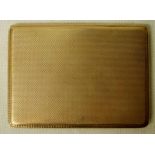 An early 20th century 9ct gold Cigarette Case, rectangular form with engine turned surfaces, 160.8g,