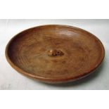 Robert 'Mouseman' Thompson of Kilburn, a circular oak fruit bowl, adzed finish, centrally with