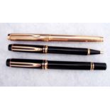 A Waterman Fountain Pen with gilt metal case and Ideal 18ct gold nib, a Waterman Fountain Pen with