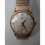 An Omega Vintage 9ct gold cased gentleman's Wrist Watch, manual wind, 29.4mm silvered dial with gilt