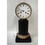 An early 20th century French Drum Clock in brass case, white enamel dial with black Roman