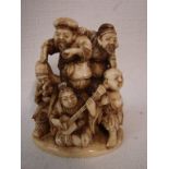 A small Japanese Meiji period carved ivory Okimono