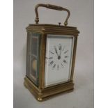 A large gilt brass framed French Carriage clock