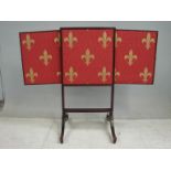 A regency style mahogany extendable fire screen