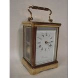 A large gilt brass framed French carriage clock