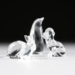 A GROUP OF THREE CRYSTAL FIGURES, MODERN, comprising a penguin figure, signed Daum France on base,