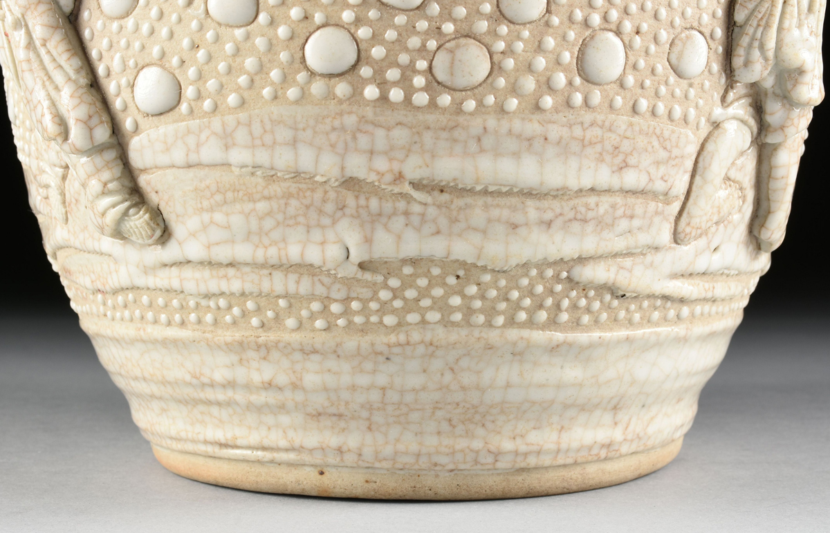 A CHINESE PORCELAIN URN WITH MOLDED DECORATION, 20TH CENTURY, with cream crackle glaze and molded - Image 5 of 14