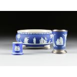 A GROUP OF THREE WEDGWOOD DARK BLUE DIP JASPERWARE BAS-RELIEF WARES, ETRURIA, STAFFORDSHIRE,