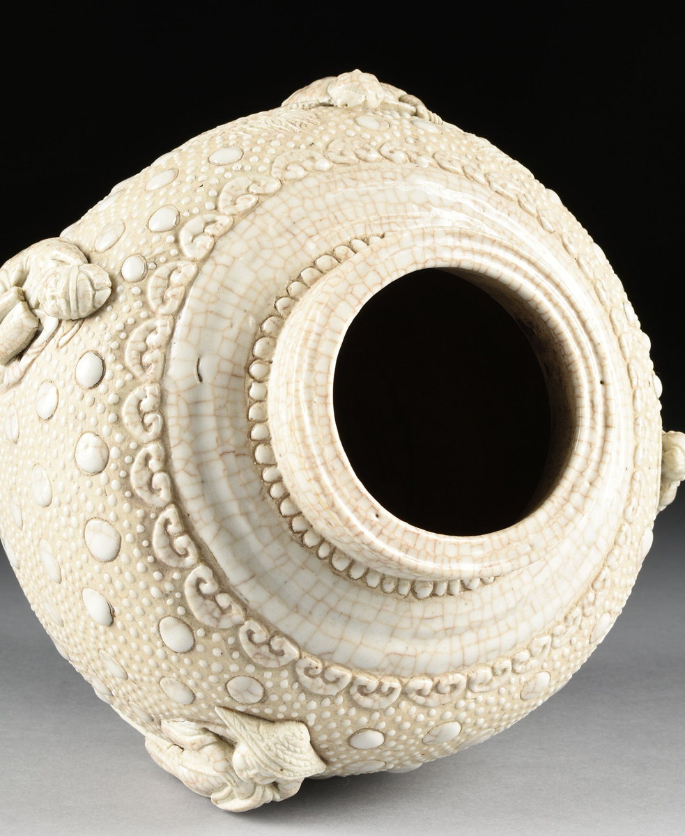 A CHINESE PORCELAIN URN WITH MOLDED DECORATION, 20TH CENTURY, with cream crackle glaze and molded - Image 14 of 14