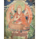AN ANTIQUE TIBETAN POLYCHROME PAINTED THANGKA, centering a seated figure, probably Tsongkhapa, oil