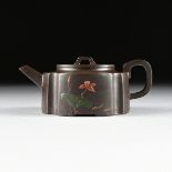 A CHINESE RED STONEWARE TEAPOT, YIXING PROVINCE, REPUBLIC PERIOD CIRCA 1917-1949, of lobed form with