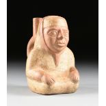 A PRE-COLUMBIAN POTTERY FIGURAL STIRRUP VESSEL, POSSIBLY MOCHE, NORTHERN PERU, 400 AD - 700 AD,