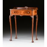 AN EDWARDIAN CARVED MAHOGANY LADY'S WRITING DESK, EARLY 20TH CENTURY, the shell carved three quarter