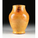 A DANISH HAND THROWN GLAZED EARTHENWARE VASE, DATED 1927, the baluster form vase with ribbed