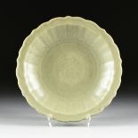 A CHINESE LONGQUAN CELADON CHARGER, MING DYNASTY (1368-1644), of lobed form with fluted sides and