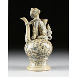 A VIETNAMESE/ANNAMESE BLUE AND WHITE CERAMIC ANIMAL MOUNTED EWER, 15TH/16TH CENTURY, the