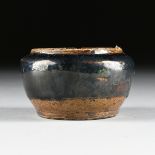 A CHINESE BLACK GLAZED STONEWARE BOWL, HENAN PROVINCE, 19TH CENTURY, of squat bulbous form with dark