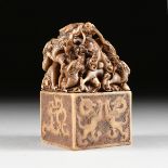 AN IMPERIAL CHINESE STYLE NINE DRAGONS CARVED SOAPSTONE SEAL, the top carved with nine writhing