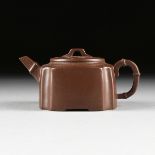 A CHINESE RED STONEWARE TEAPOT, YIXING PROVINCE, REPUBLIC PERIOD, LATE 20TH CENTURY, of lobed form