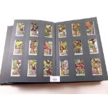 Cigarette cards - album of part sets (several very near complete) including Wills British
