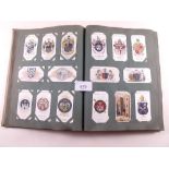 Cigarette card - album with part sets/odds including Wills 1908 Cricketers (mixed large and small '