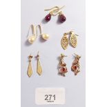 Five pairs of gold earrings