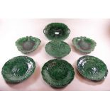 A collection of seven Victorian green Majolica glazed leaf plates