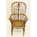 An antique elm seated farmhouse chair