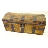 An antique small wooden trunk with hide covering and metal mounts - 69cm wide