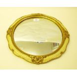 A cream and gilt convex frame mirror , 37cm dia incl frame
