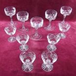 A set of six Waterford cocktails glasses and five facet cut champagne glasses