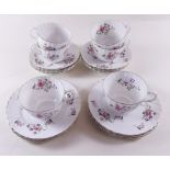 A Royal Adderley floral printed tea service comprising: six cups and saucers and six tea plates