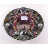 A Palissy style plate with crab