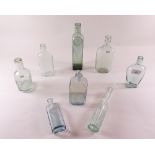 A group of eight various old medicine and other bottles