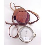 A WWII cased barometer/altimeter