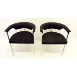 A pair of retro modernist chrome tub chairs