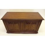 A mid 20th century carved oak blanket box with linenfold decoration, 37 x 17 x 21" high