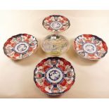 Four Imari plates and a satsuma plate