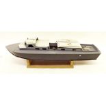 A wooden model boat with engine - 91cm