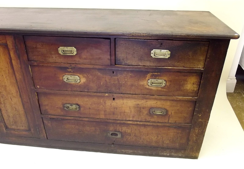 An early 19th century pine side cabinet with cupboard and drawers with military style brass handles, - Image 3 of 6