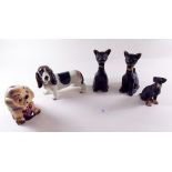 A group of dog and cat ornaments