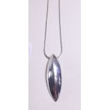 A silver "Oropiu" pendant and chain