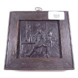 A Dutch cast metal small plaque after Teniers in oak frame - 8.5 x 9.5cm