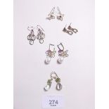 Five pairs of gold stone set earrings