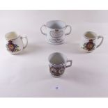 An Upton Upon Severn Royal Commemorative two handled cup 1911 and three other commemorative items