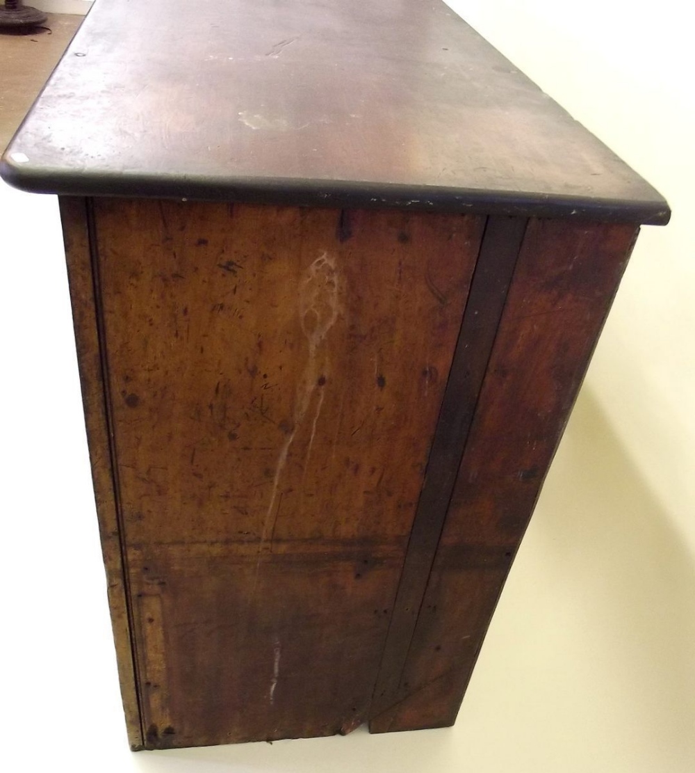 An early 19th century pine side cabinet with cupboard and drawers with military style brass handles, - Image 4 of 6
