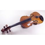 An early 20th century handmade violin - a copy after Borelli - damage to back and a bow a/f