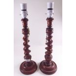 A pair of barleytwist treen table lamps , 37cm high , excl fitment