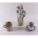 A Victorian Staffordshire archer, a small tankard and Torquayware egg cup